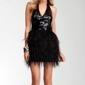 black sequin dress with feathers